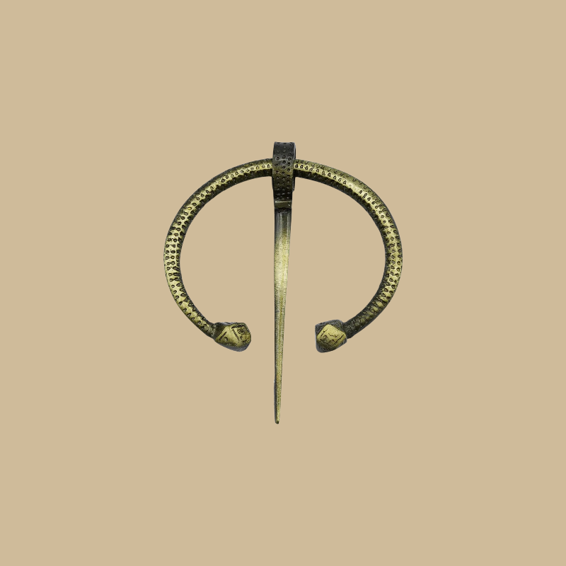 Circular brass brooch in an annular shape